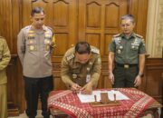 Jaga Kondusifitas Pilkada 2024 Polres Metro Tangerang Kota Tandatangani NPHD Dengan Pemkot Tangerang