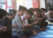 Polres Malang Bareng JSKK Dan PK3 Gelar Doa Bersama Di Pintu 13 Stadion Kanjuruhan