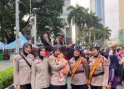 Polwan Polres Metro Jakarta Pusat Amankan Car Free Day di Bundaran HI
