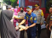 Bakti Sosisl Polres Metro Jakarta Timur Bersama Bhayangkari Bagikan Ratusan Nasi Kotak