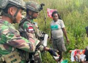 Satgas Yonif 509 Kostrad Rutin Berbagi Bantuan Door to Door Di Intan Jaya Papua