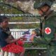 Satgas TNI Peduli Bagikan Baju Baru Dan Alas Kaki Untuk Warga Bilogai