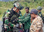 Satgas Yonif 509 Kostrad Laksanakan Patroli Keamanan dan Komsos di Pasar Sugapa
