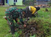 Peduli Lingkungan, Satgas Habema Bersama Warga Bersihkan Lapangan Gereja Kenyam