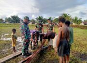 Satgas Habema Dan Warga Mumugu Gotong Royong Bangun Lapangan Voli