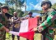 Warga Milawak Antusias Kibarkan Merah Putih Bersama Prajurit Habema