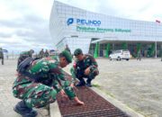 Satgas Yonarmed 11 Kostrad Gelar Aksi Bersih-Bersih Di Pelabuhan Semayang Balikpapan