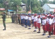 Satgas Habema Bersama Warga Ayata Gelar Upacara Sumpah Pemuda