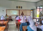 Polres Metro Bekasi Gelar Pembinaan Dan Penyuluhan Di SMAN 2 Cibitung Dalam Program Mahasiswa Mengajar Polda Metro Jaya