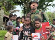 Komsos Marinir Habema Disambut Gembira Anak-Anak Kuari