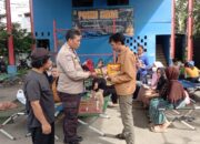 Penyaluran Bantuan Kepada Korban Terdampak Banjir Oleh Anggota Bhabinkamtibmas Polsek Benda