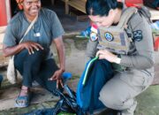 Senyum Polwan Ops Damai Cartenz Membawa Berkah Bagi Mama-Mama Papua Di Pasar Lama Oksibil