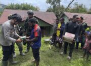 Satgas Ops Damai Cartenz-2025 Salurkan Bantuan Sembako Untuk Warga Kiwirok