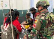 Aksi Heroik TNI Puncak Jaya Evakuasi Anak Papua yang Sakit ke RS Mulia